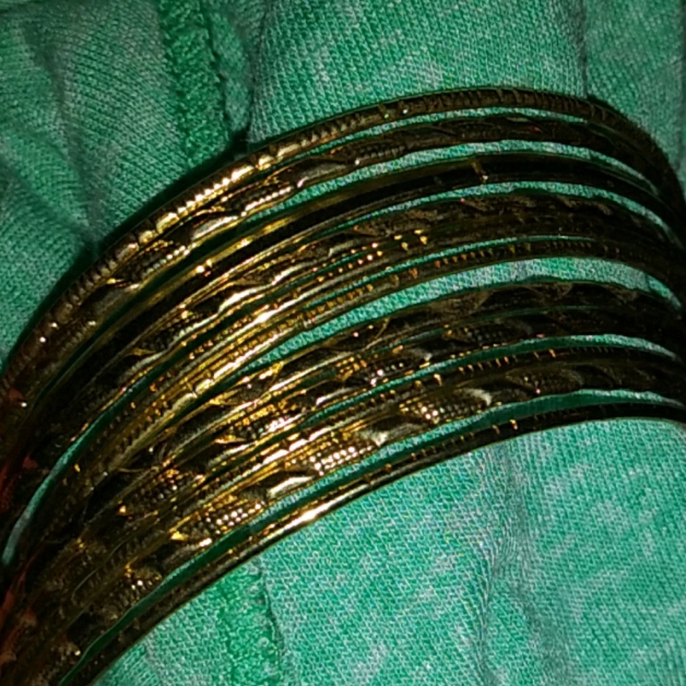 LOT of 11 gold tone bangle bracelets